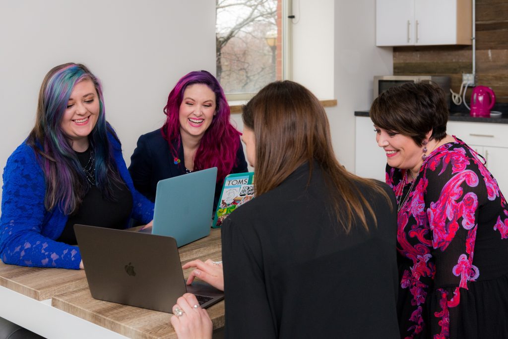 Colleagues laughing